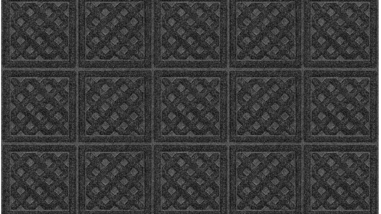 Rubber-backed door mat