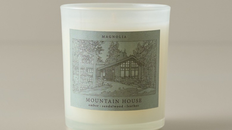 Magnolia Mountain House Candle with green Mountain House illustration on the label