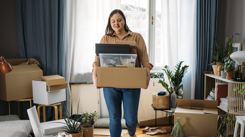 Woman clearing clutter