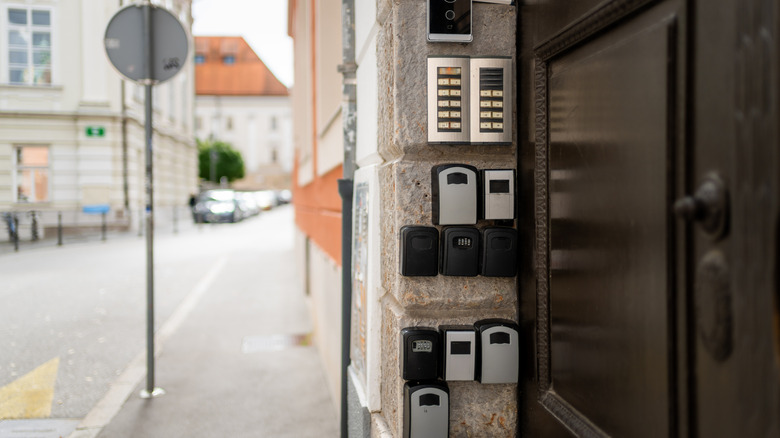 Residential building with multiple lockboxes for tourist apartment keys