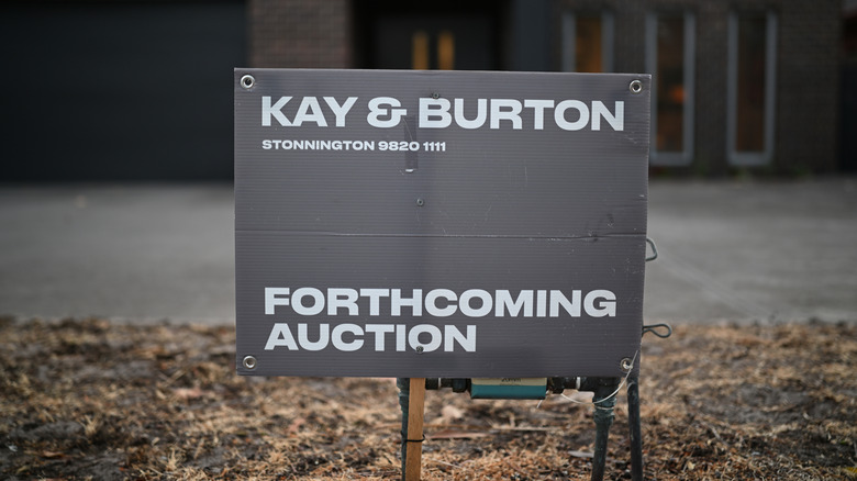 Real estate sign in yard