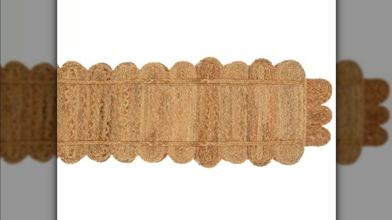 A scalloped jute table runner.