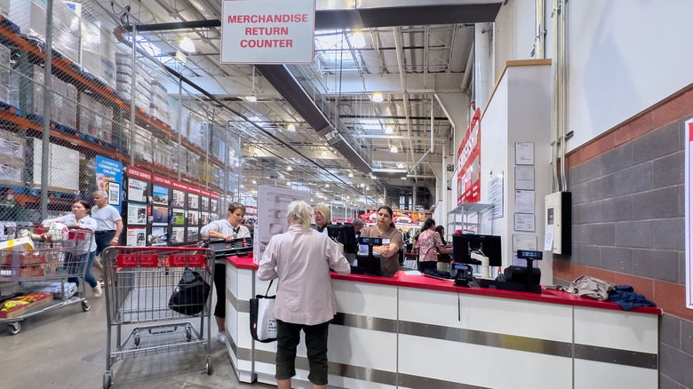 A woman at the Costco returns counter