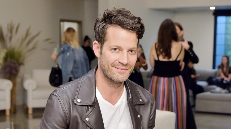 Nate Berkus smiling at an event