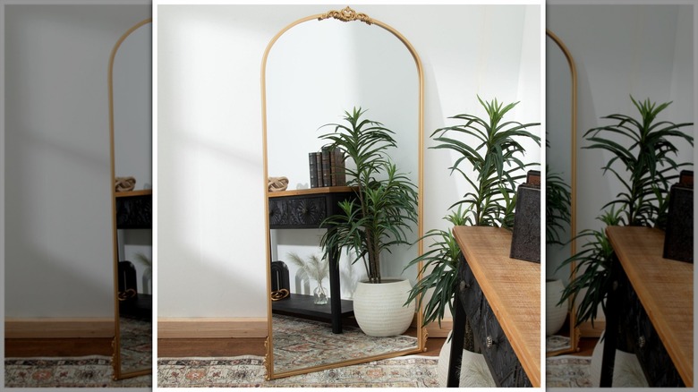 gold ornate floor mirror