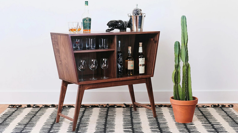 Vintage 1950s bar cabinet evokes similar setups of that time.