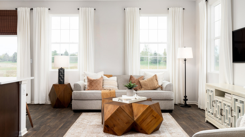 Curtains hung halfway to ceiling