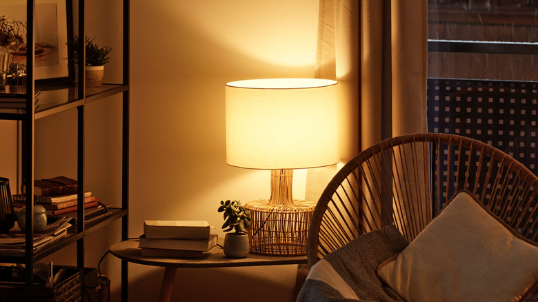 A cozy table lamp in living room creating a glow
