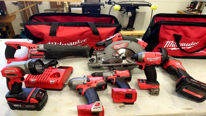 View of a Milwaukee M18 FUEL 18V Lithium-Ion Brushless Cordless Combo kit with impact drivers, LED light and more