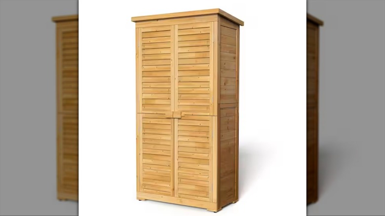 A Lofka Nature Wood Outdoor Storage Cabinet from Home Depot