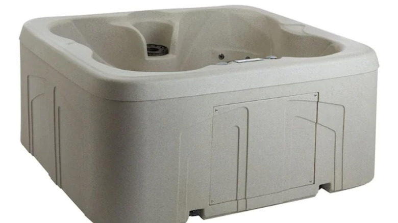 beige Lifesmart four-person hot tub