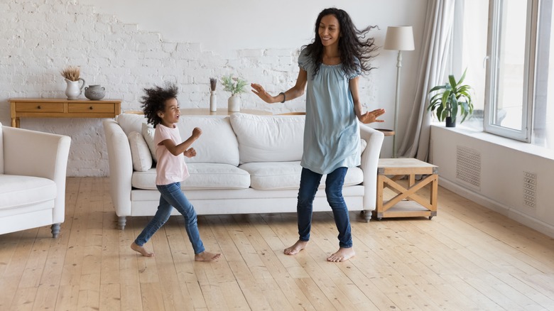 Mom and child dancing