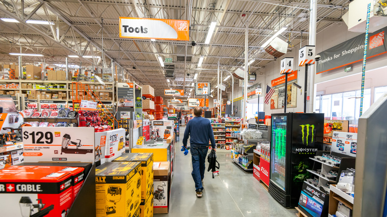 Person walking into tools section at Home Depot