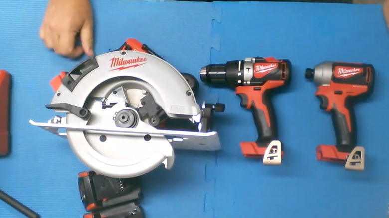 a circular saw, drill, and impact driver from the Milwaukee M18 system