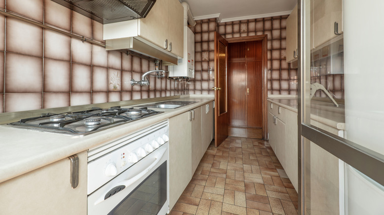 Formica countertops in an outdated kitchen