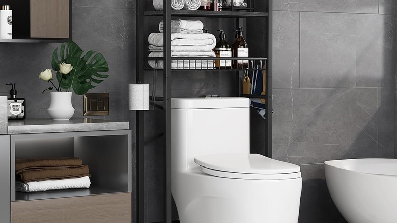 modern toilet with black freestanding and open shelving