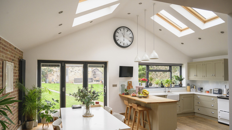A kitchen with several skylights.