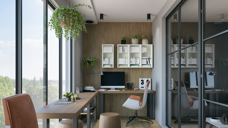 home office seperated by a window wall