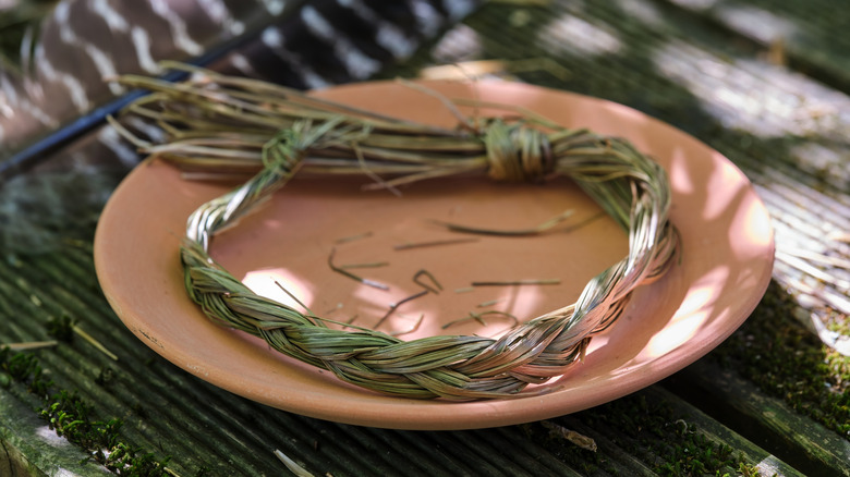 Braid of sweetgrass in a dish