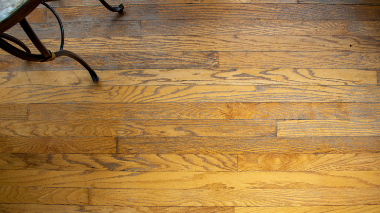 Wood floors with water damage and staining