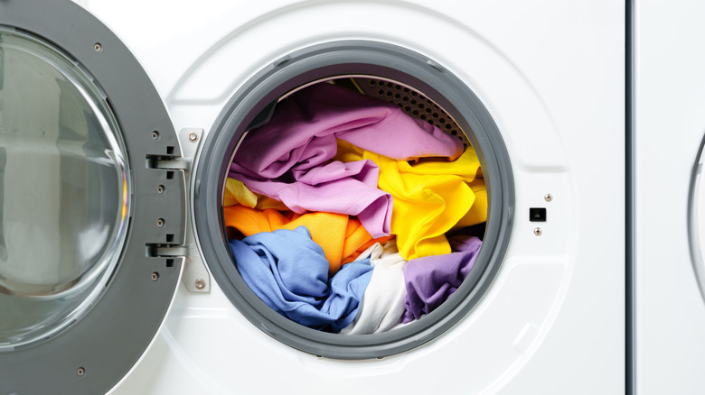 White Washing Machine With Open Door in a Laundry Room