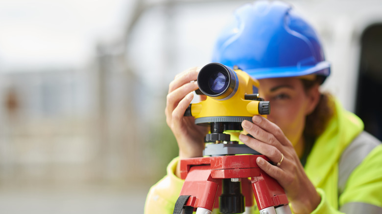 Woman doing a property line survey