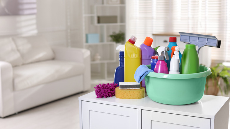 cleaning products on a white cabinet