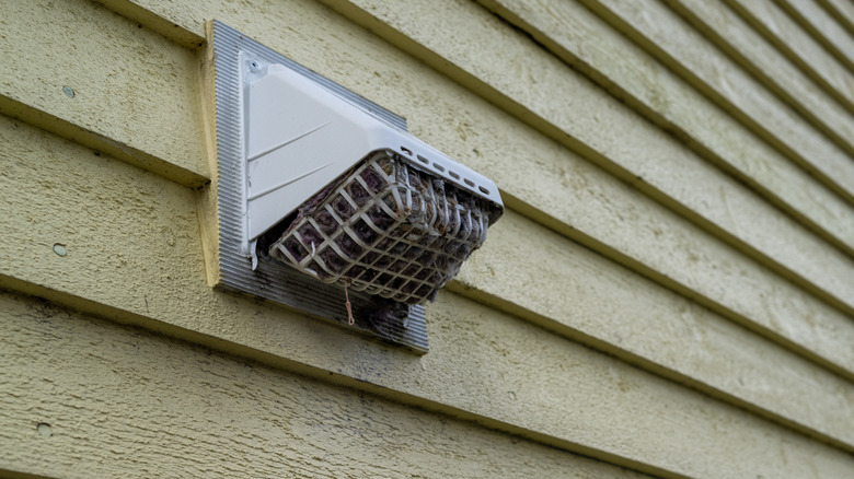 An outside dryer vent that is clogged with lint