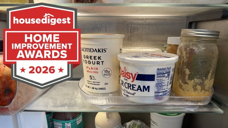 Condiments and food products on a clear turntable organizer in a refrigerator