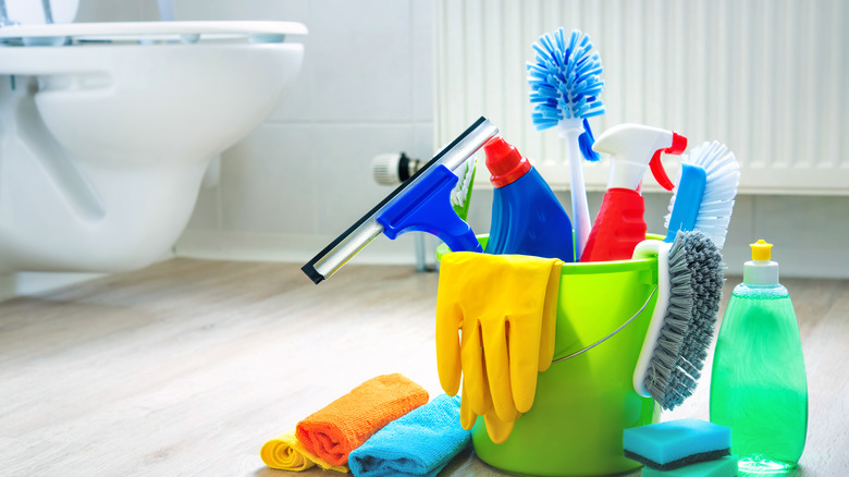 Cleaning supplies in a bucket 