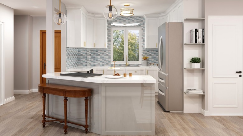 White kitchen with chopped island