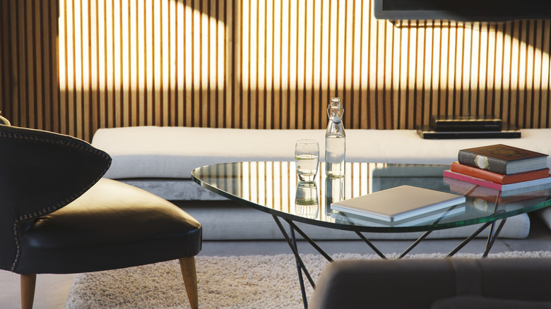 Closeup of living room with triangle glass coffee table