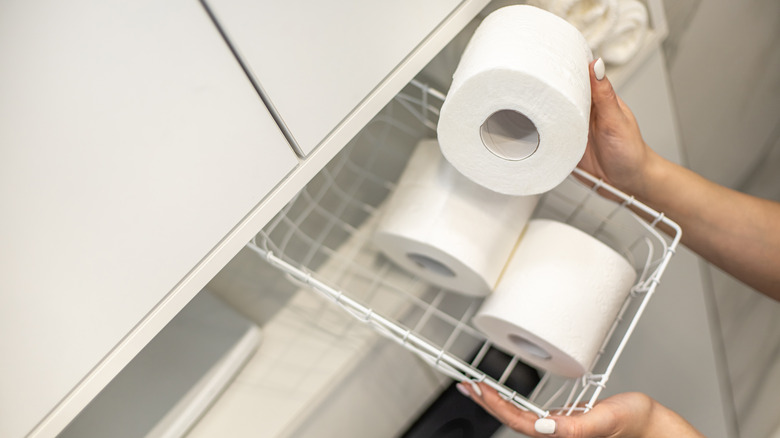 toilet paper rolls in basket