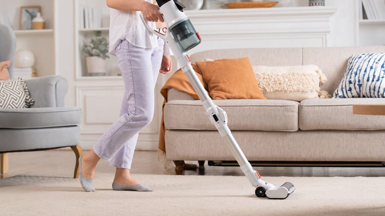 Person cleaning carpet