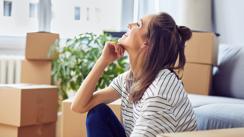 Girl with moving boxes