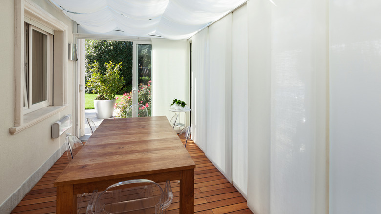 White curtains on balcony