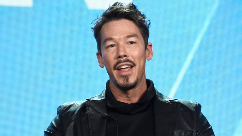 David Bromstad being interviewed at an event.