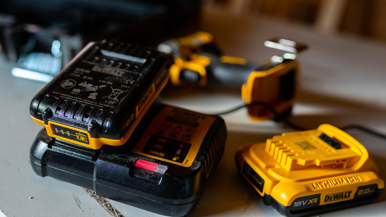 Dewalt lithium-ion battery charging in a small woodworking station