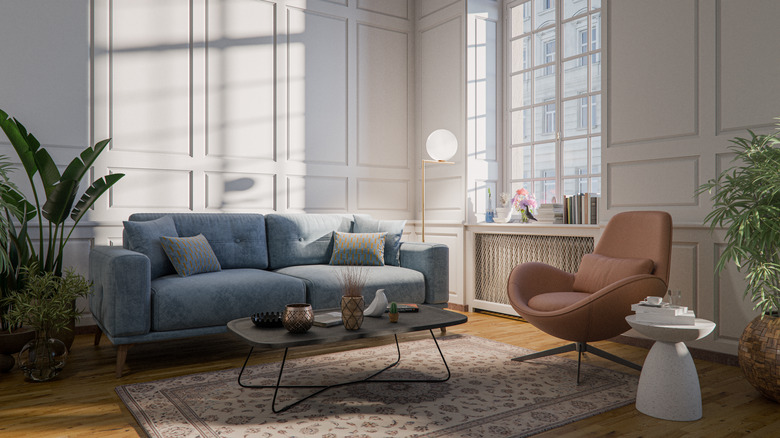 A modern living room filled with light.