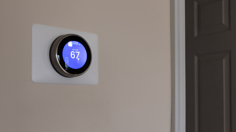 Smart thermostat in cooling mode at 67 degrees