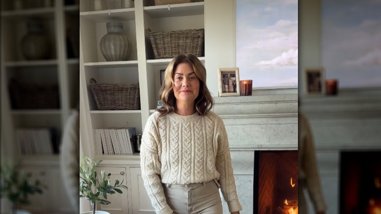 Jillian Harris giving a living room tour.