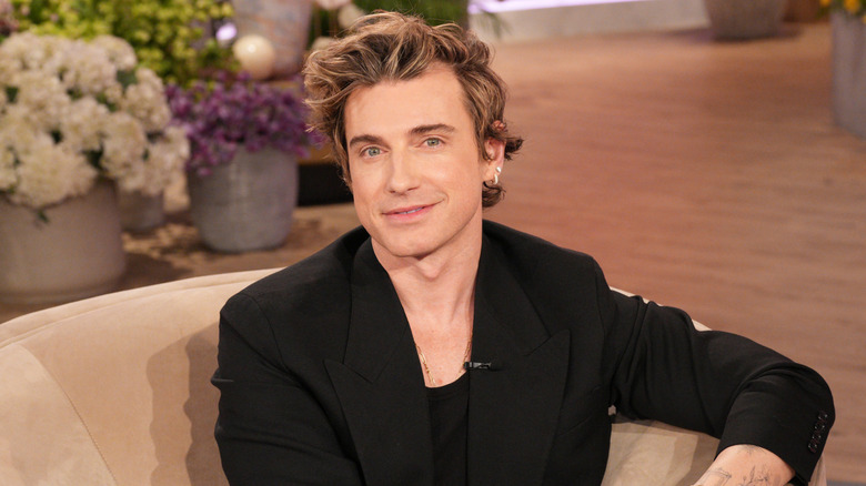 Jeremiah Brent smiling in a black jacket