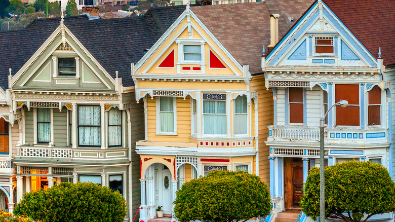 three colorful houses