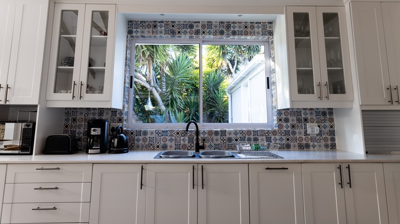 Sink centered under kitchen window