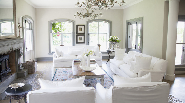 Bright living room with white furniture