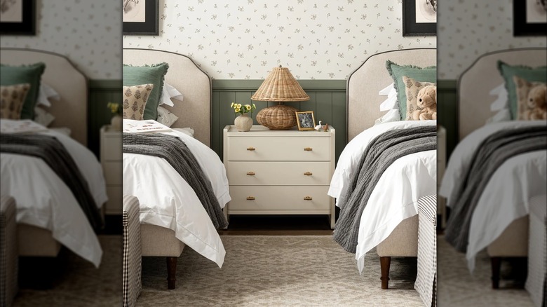 Bedroom with floral wallpaper and rug