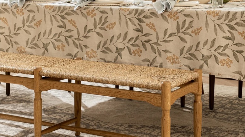 Tablecloth with leaves on top of a table