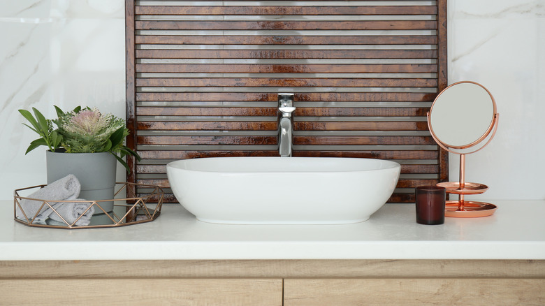 Vessel sink on styled countertop