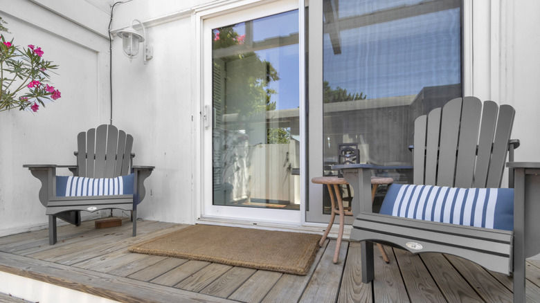 decorated patio with sliding glass door