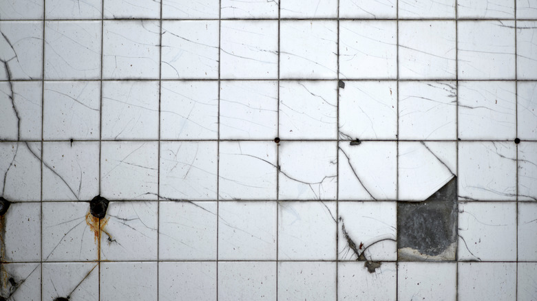 broken ceramic tiles in a shower